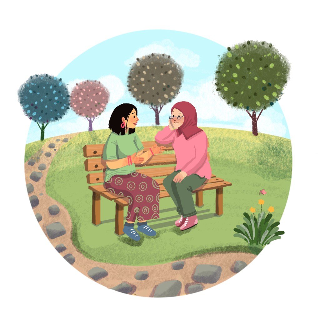 Two people sitting on a park bench, talking and listening to each other